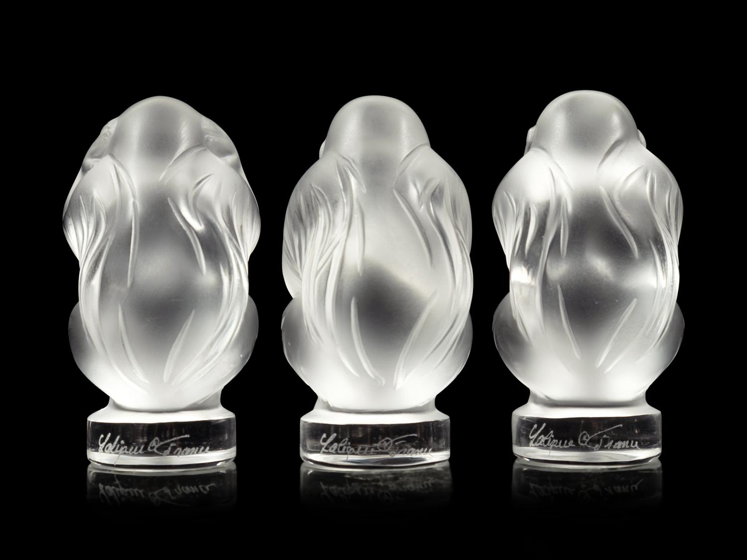 A Set of Three Lalique Sagesse Figures