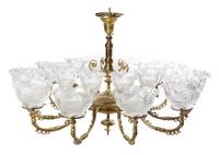 An American Brass Twenty-Light Chandelier, Height 28 x diameter 39 inches.