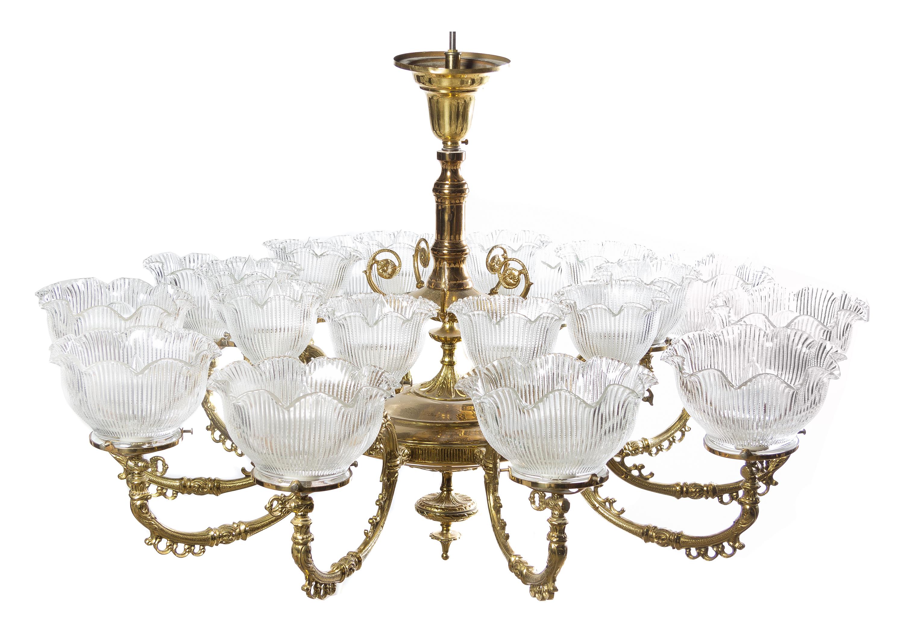 An American Brass Twenty-Light Chandelier, Height 28 x diameter 39 inches.
