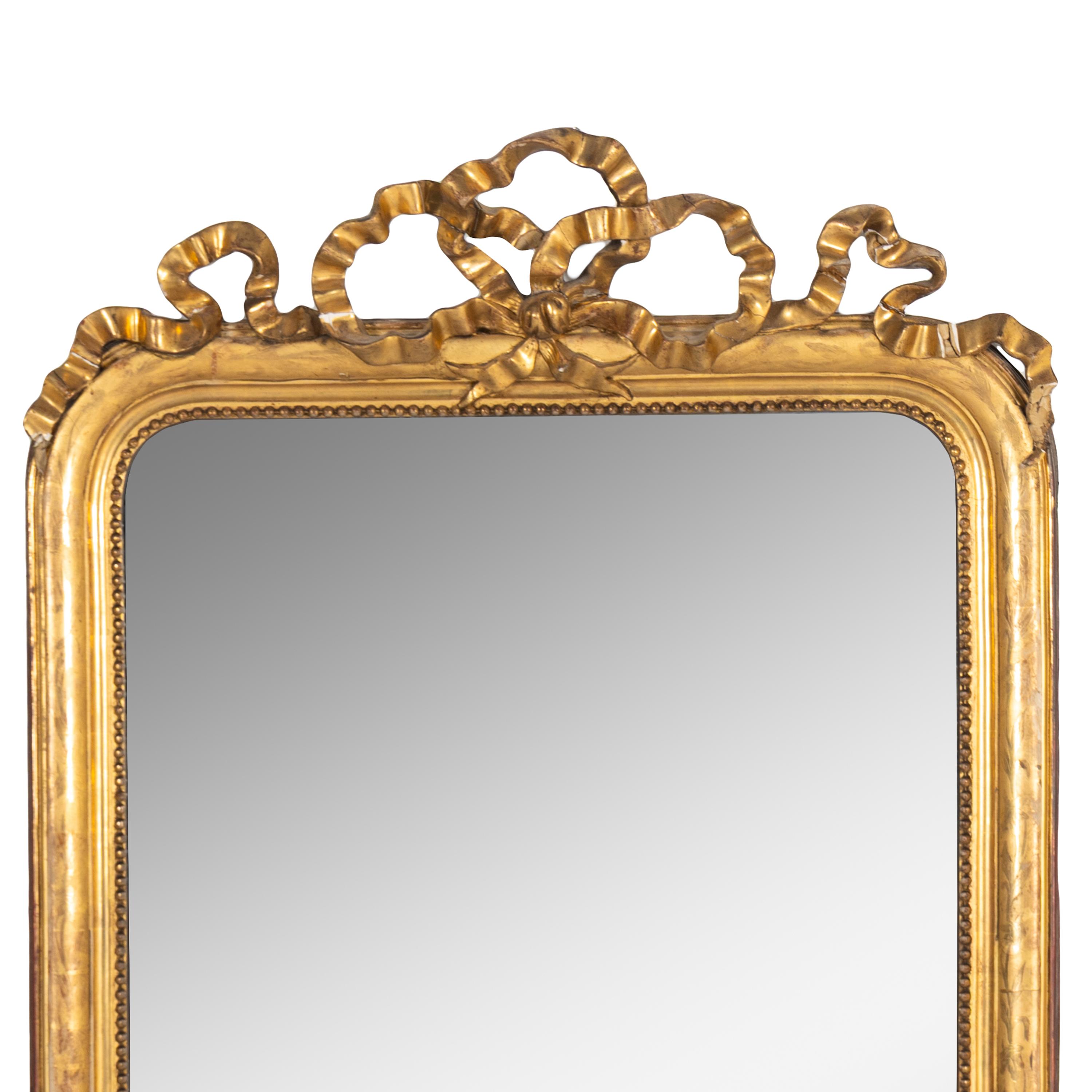 A Napoleon III Carved Giltwood Mirror