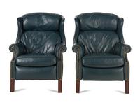 A Pair of George III Style Mahogany and Leather Upholstered Reclining Wingback Chairs