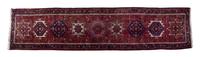 A Heriz Wool Runner 3 feet 2 inches x 12 feet 10 inches. — PERSIA