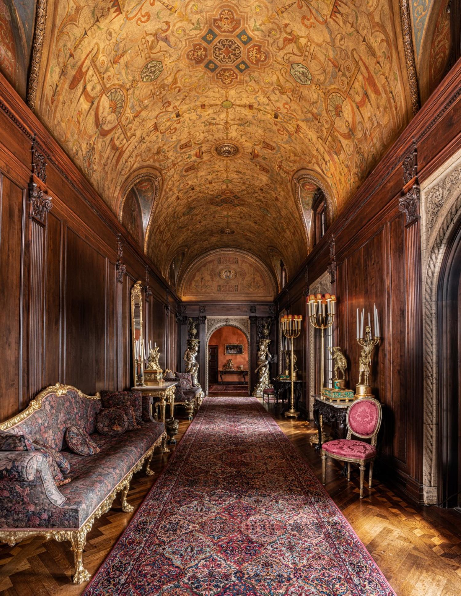 A Louis XVI Style Gilt Bronze and Malachite Veneered Mantel Clock