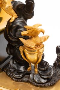 An Empire Gilt and Patinated Bronze Figural Mantel Clock