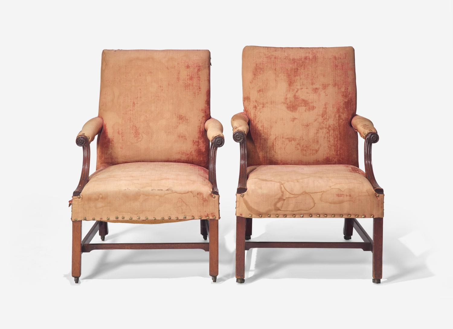 A Near Pair of George III Mahogany Library Armchairs