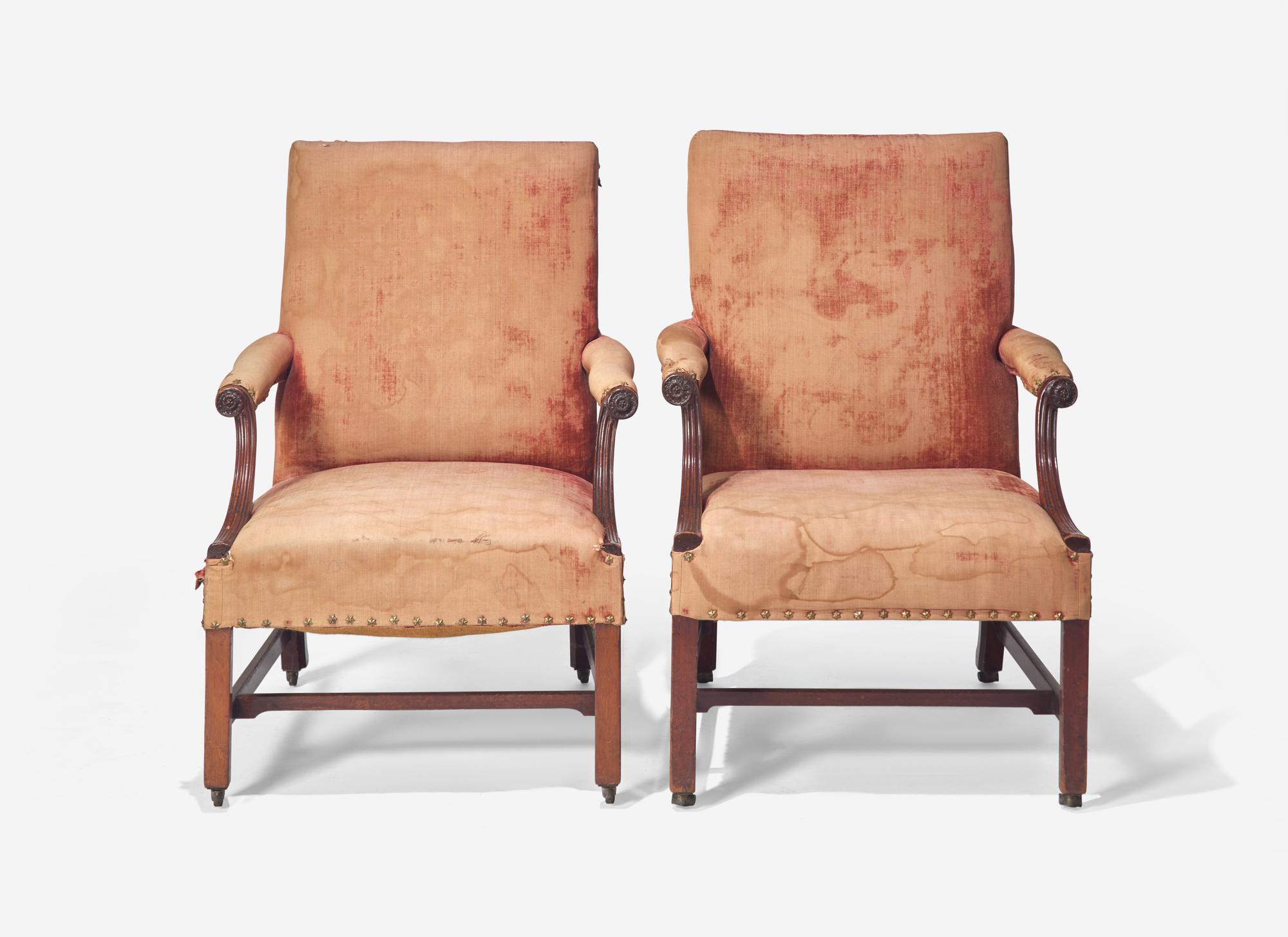 A Near Pair of George III Mahogany Library Armchairs