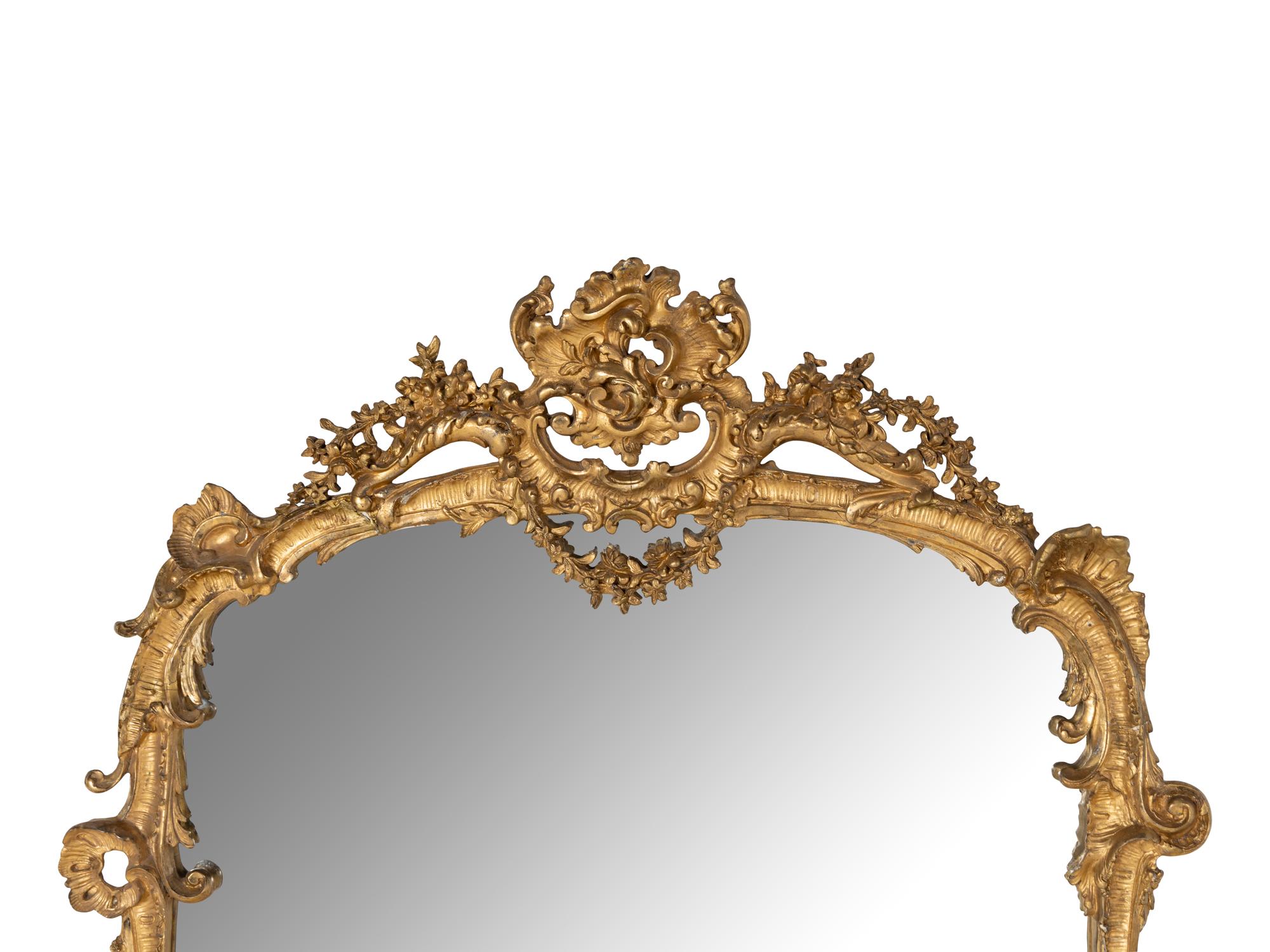 A Rococo Revival Giltwood Mirror