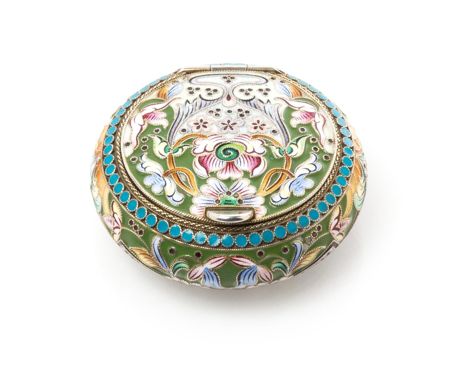 A Russian Enameled Silver Snuff Box, Mark of Third Jewelry Artel, St. Petersburg, early 20th century, of circular form, the case having