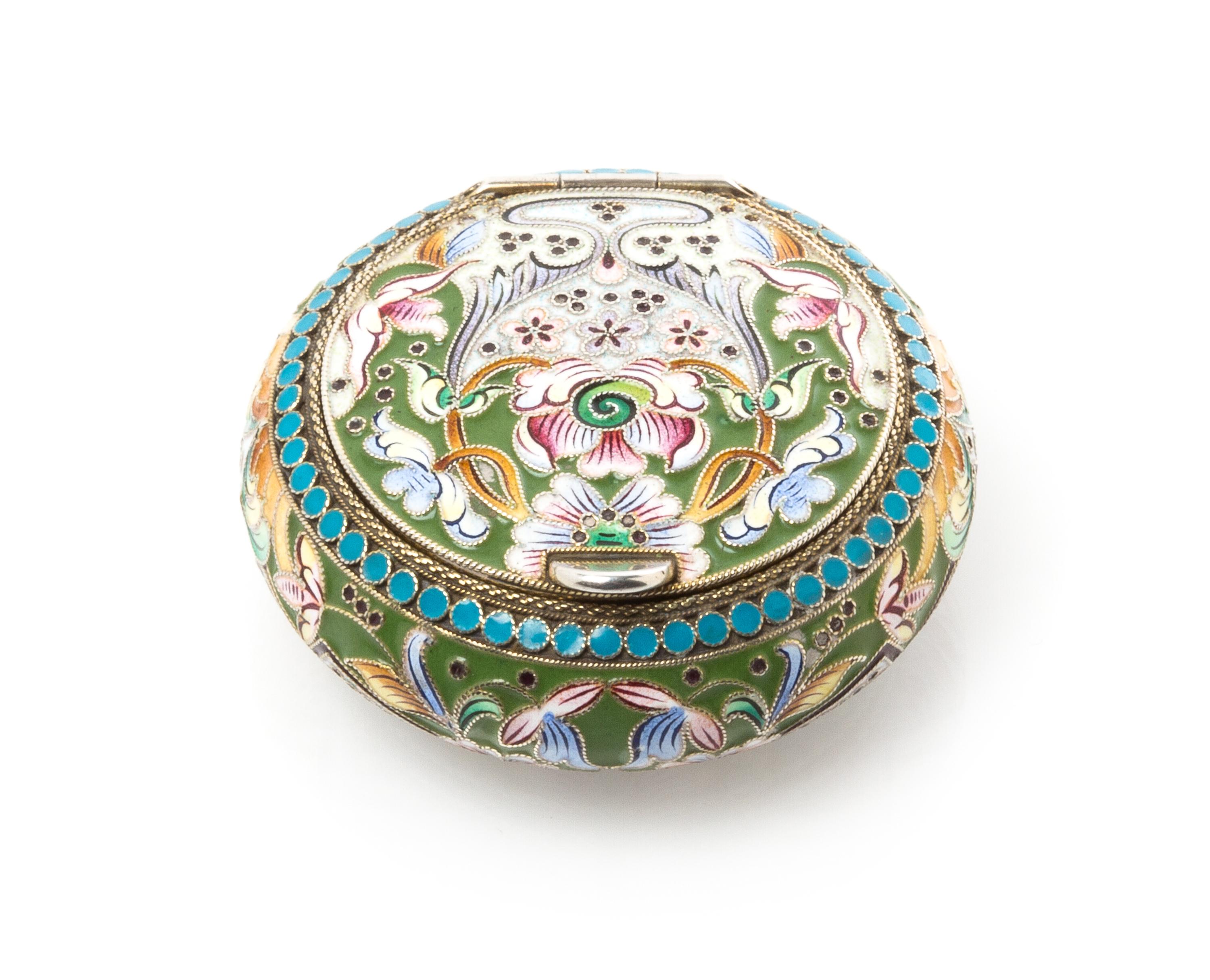 A Russian Enameled Silver Snuff Box, Mark of Third Jewelry Artel, St. Petersburg, early 20th century, of circular form, the case having