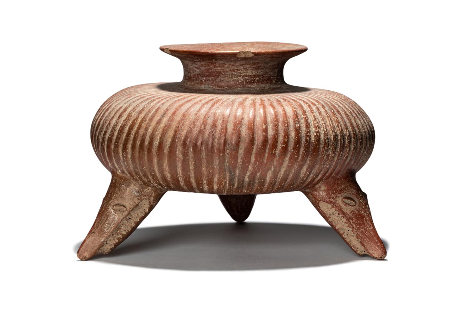A Colima Gadrooned Vessel with Shark Feet