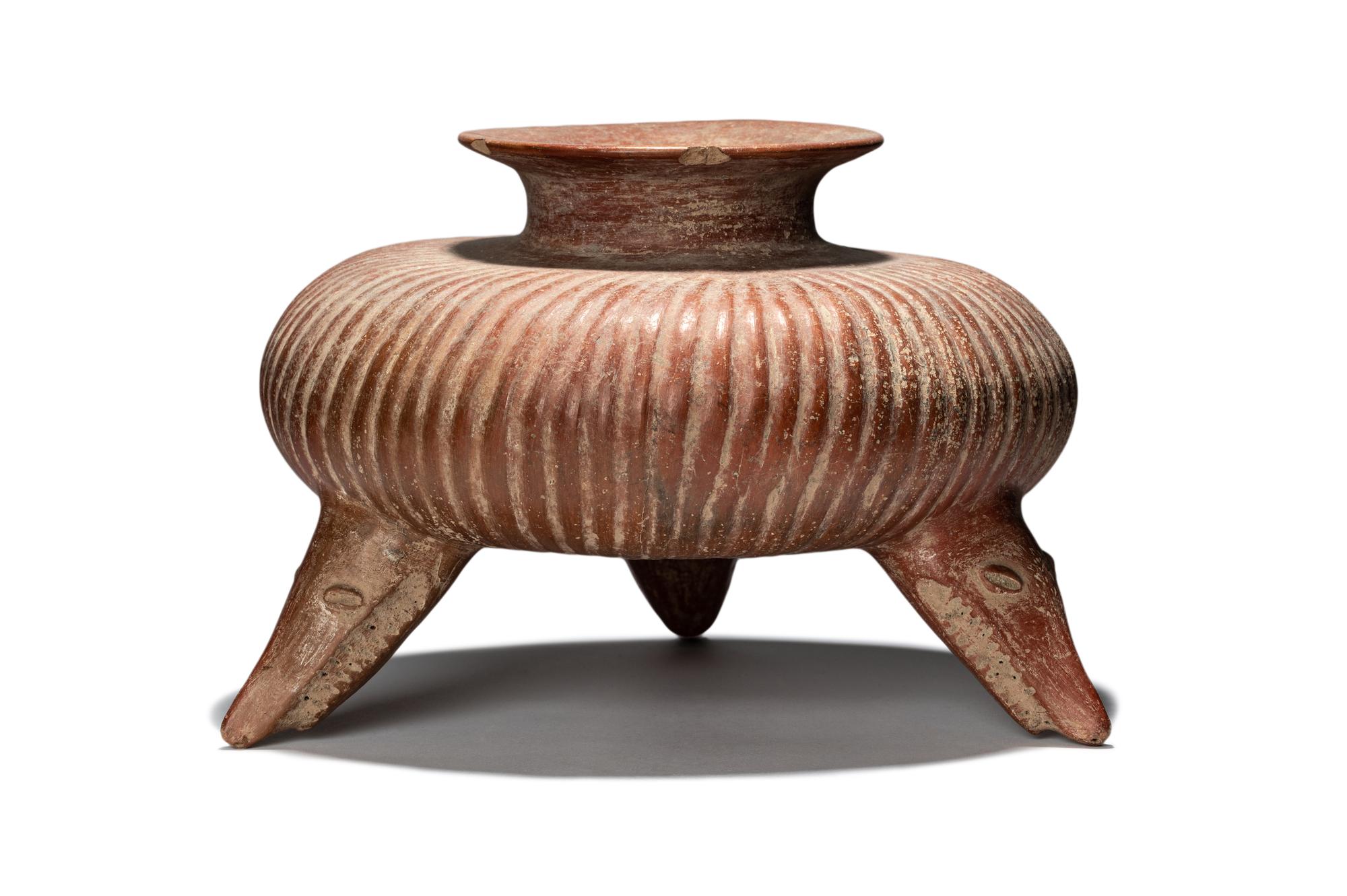 A Colima Gadrooned Vessel with Shark Feet