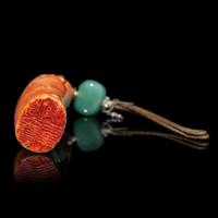 Two Chinese Red Coral Scholar's Objects, 19th-20th Century 晚清-民國 紅珊瑚鼻煙壺及獸鈕章