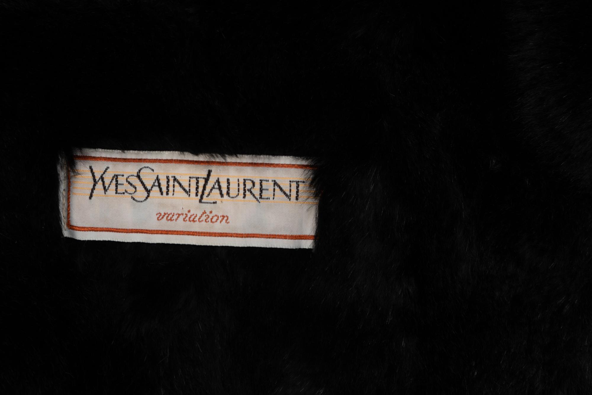 Two Designer Coats; One Yves Saint Laurent, One Pauline Trigère,