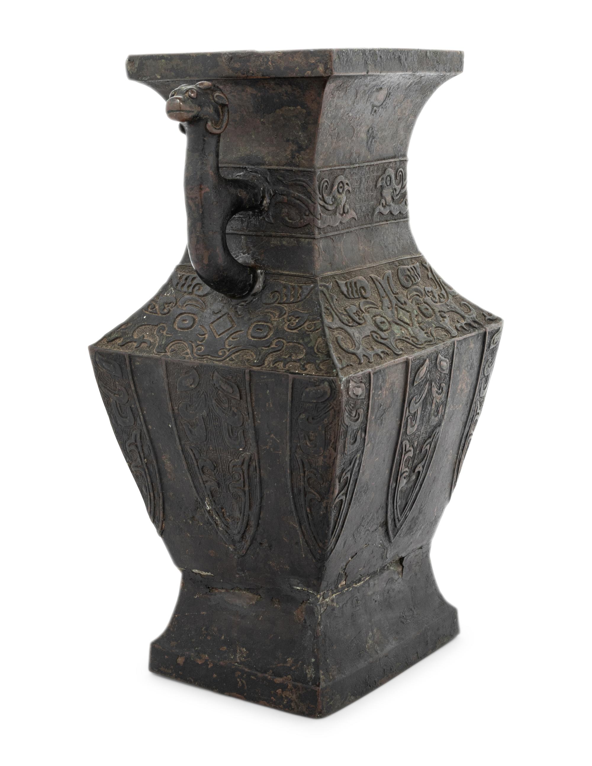 An Archaic Bronze Handled Hu Vessel