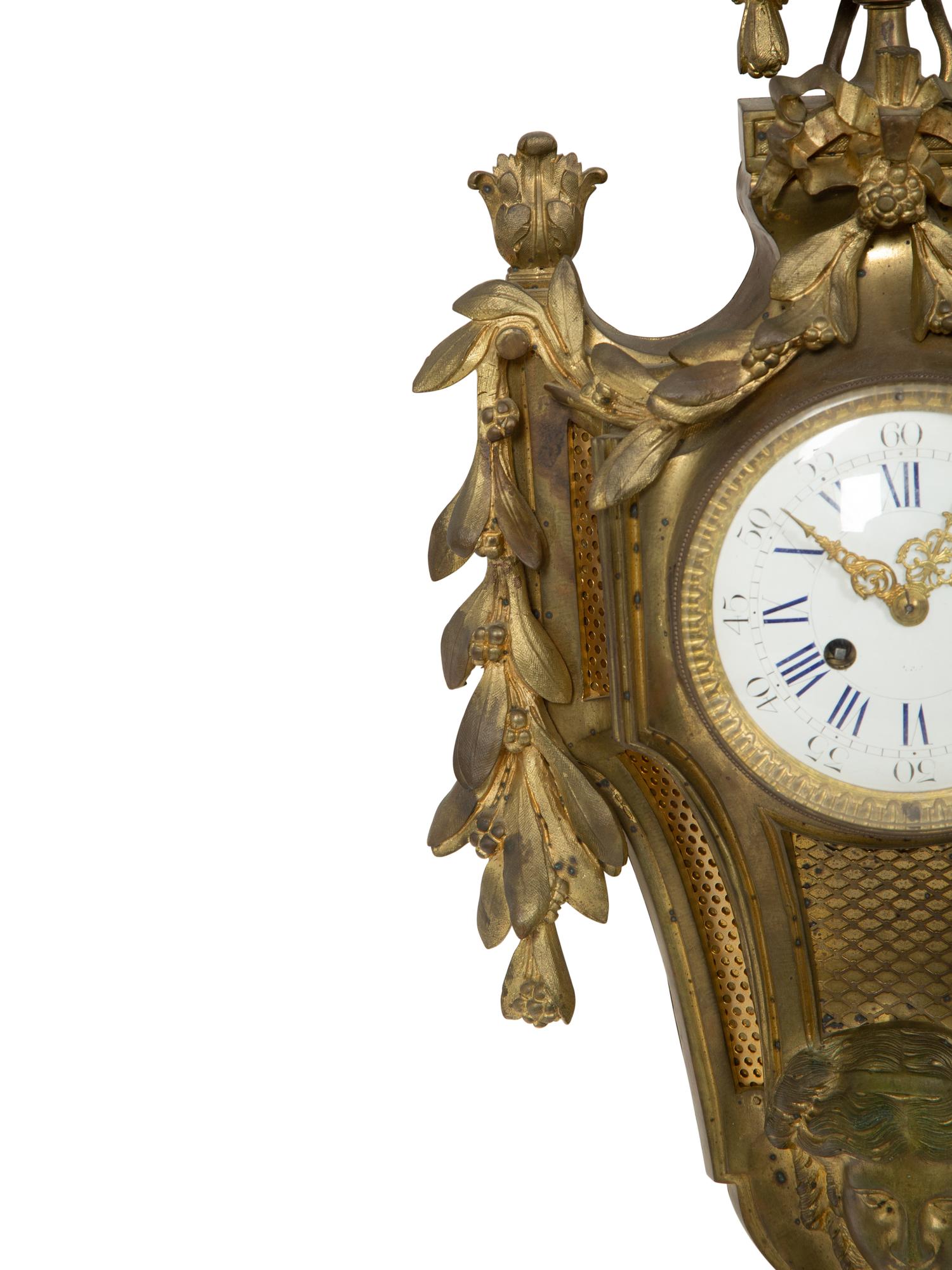 A Louis XVI Style Gilt Bronze Cartel Clock