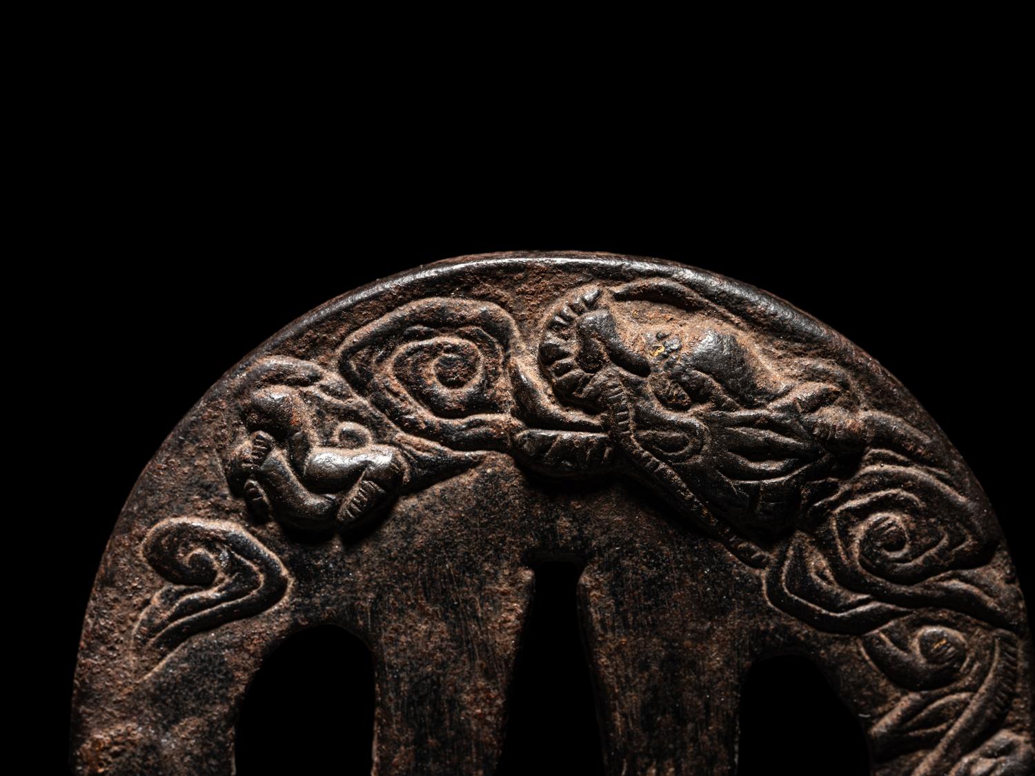 Two Japanese Cast Iron Tsuba
