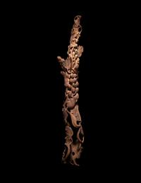 A Chinese Chenxiang Wood 'Squirrel and Grapes' Carving