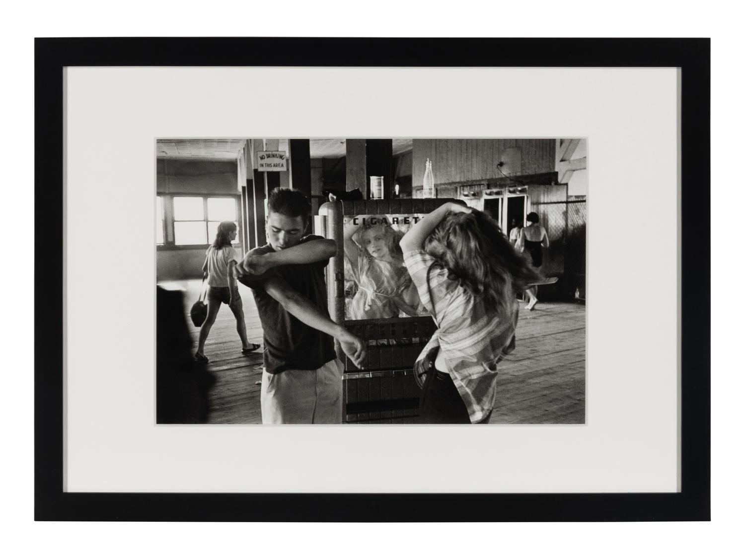 Cathy Fixing her Hair in Cigarette Machine Mirror (from Brooklyn Gang ) , 1959
