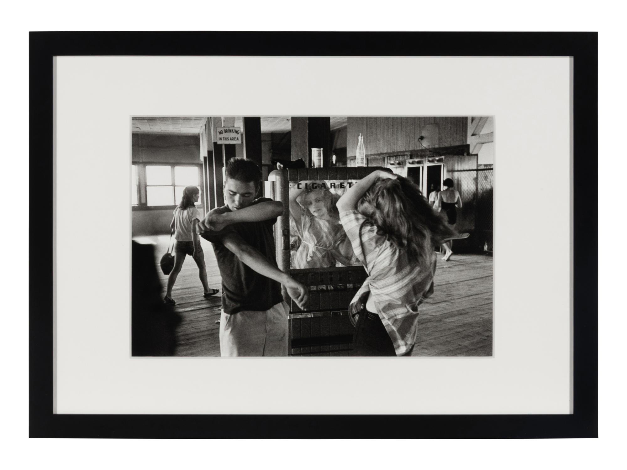 Cathy Fixing her Hair in Cigarette Machine Mirror (from Brooklyn Gang ) , 1959