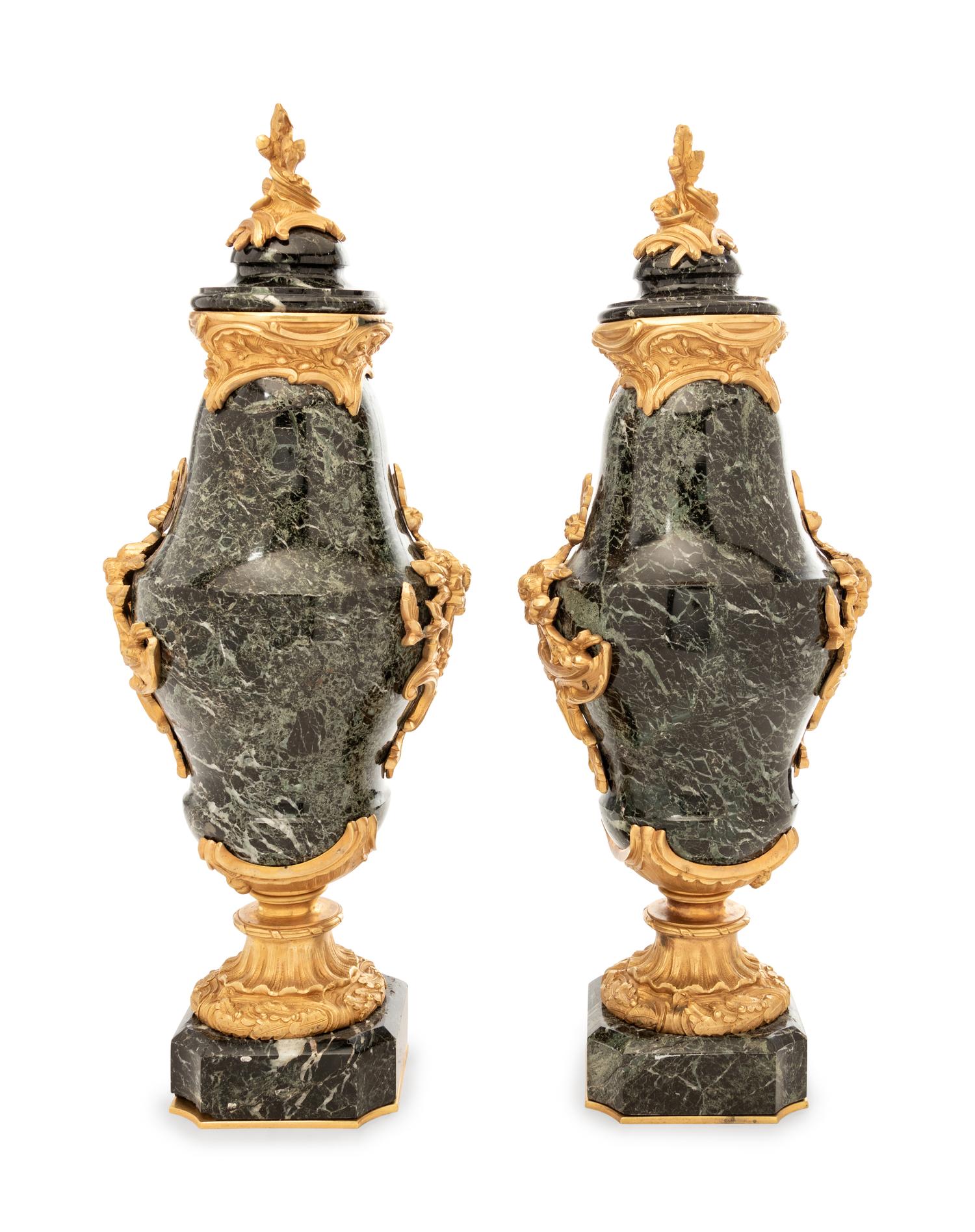 A Pair of Continental Gilt Bronze Mounted Marble Urns