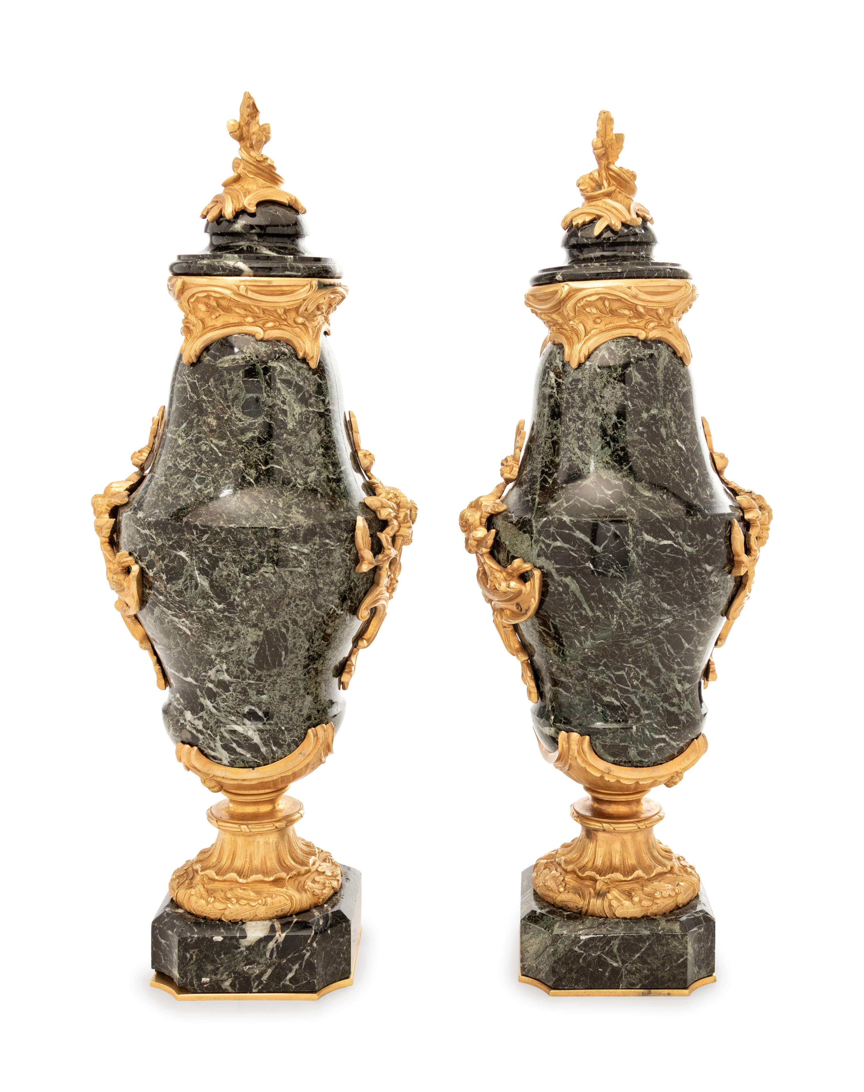 A Pair of Continental Gilt Bronze Mounted Marble Urns