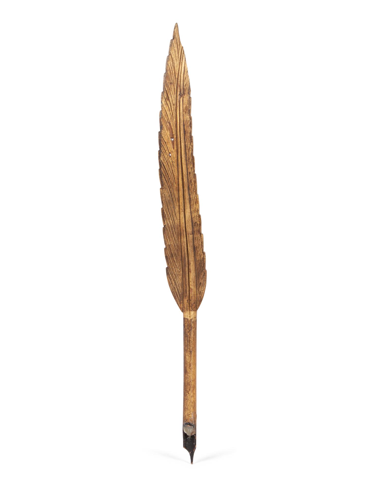 A Wooden Parcel Gilt Quill Weather Vane Fragment