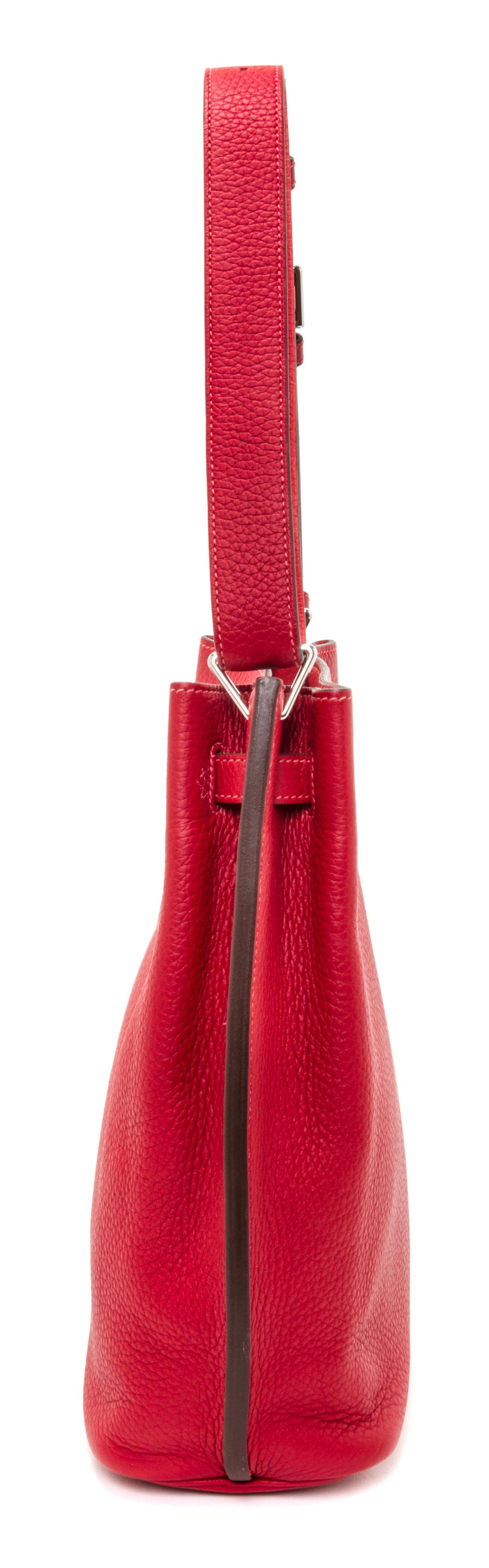 An Hermes Rouge Casaque Taurillon Clemence 22cm So-Kelly Handbag, 9" x 11" x 4.5".