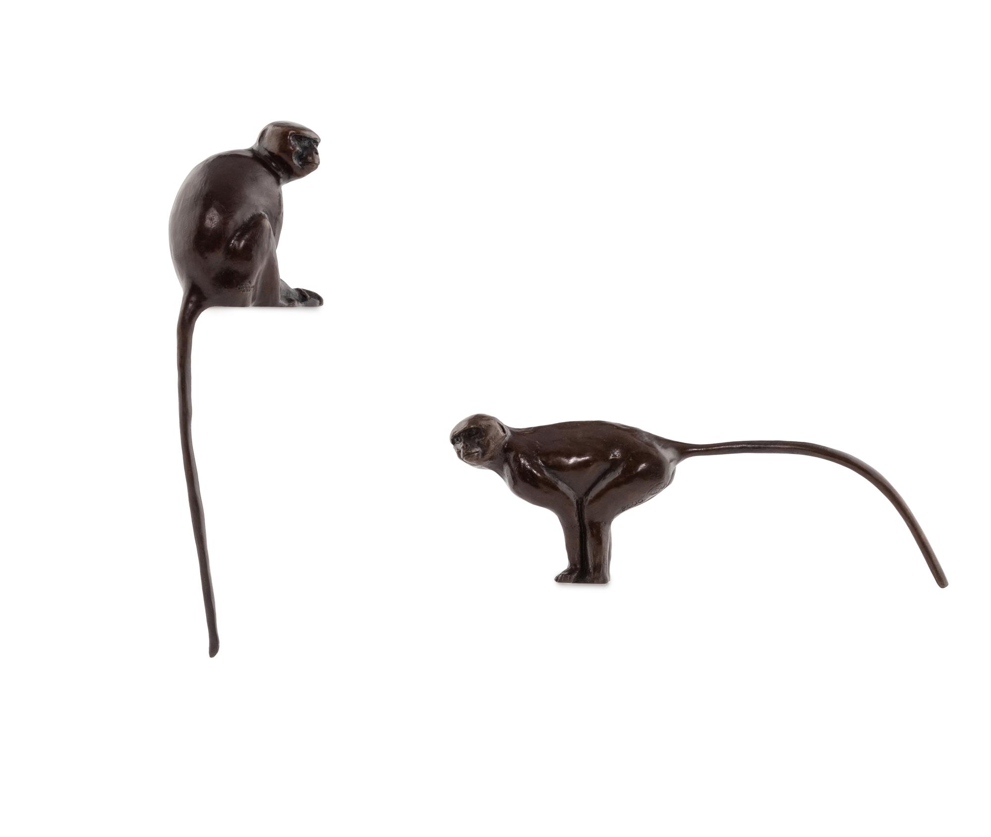 A Pair of Donald Greig Bronze Monkey Figures