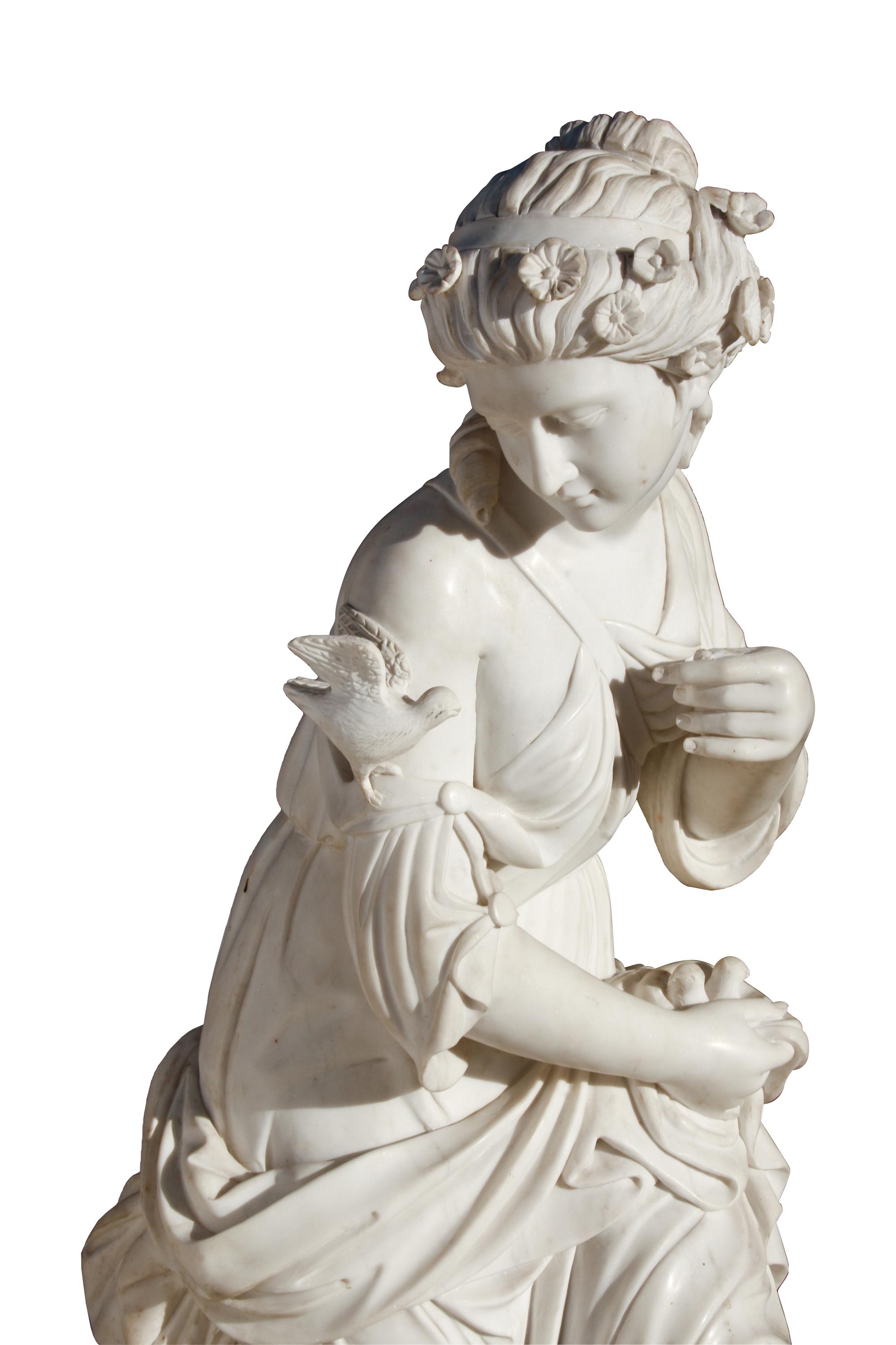 An Italian Marble Figure of a Woman with a Bird