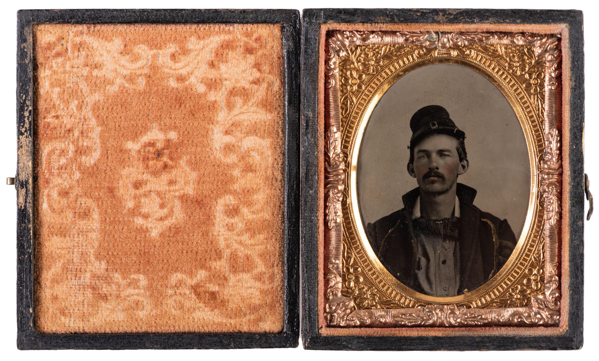 A group of 14 items identified to Captain William L. Curry, Company K, 1st Ohio Volunteer Cavalry, incl. inscribed Model 1840 US Army regulation cavalry saber, belt plate, spurs, and tintype.