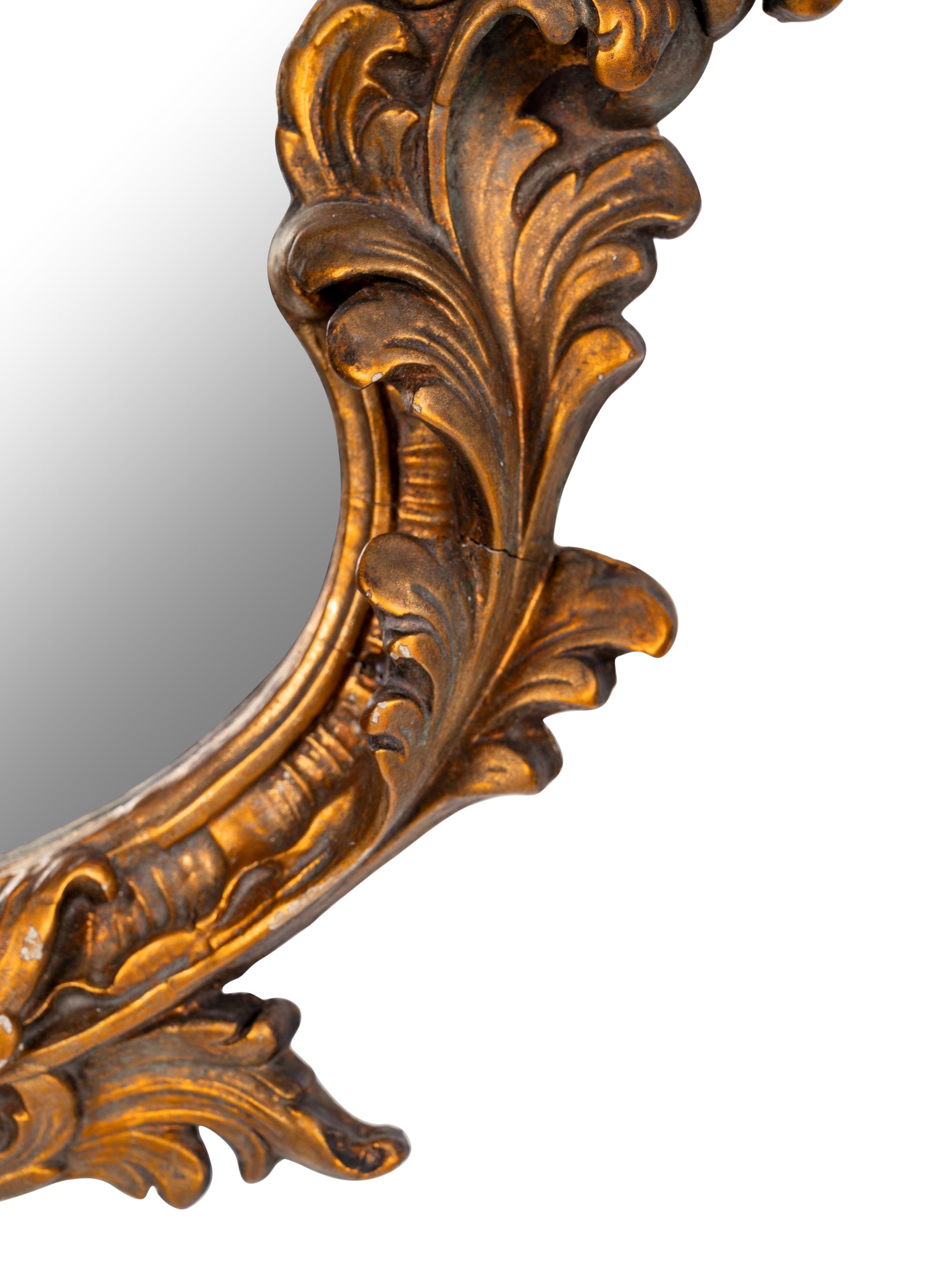 A Pair of Italian Rococo Style Giltwood Mirrors