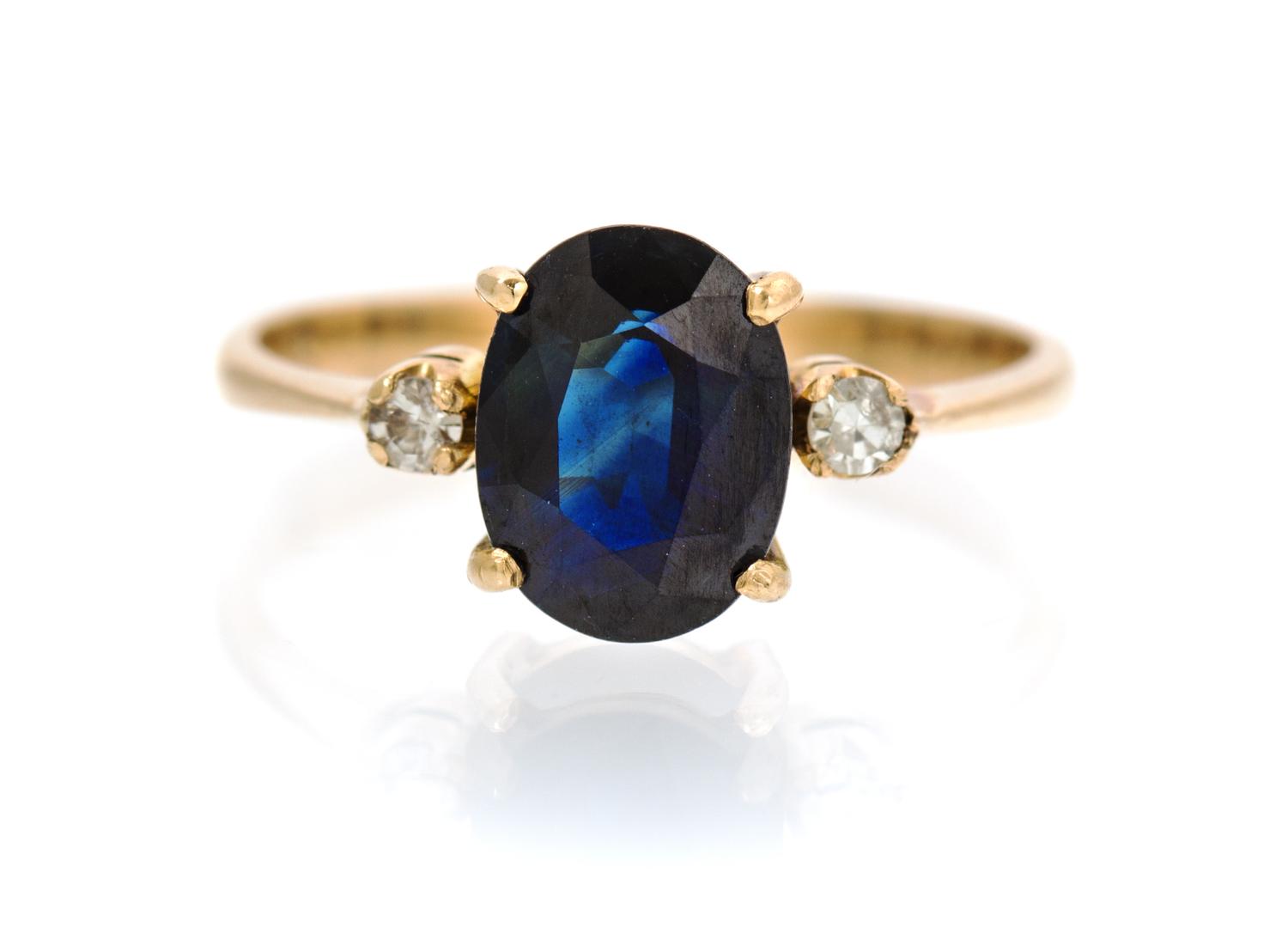 A 14 Karat Yellow Gold, Sapphire and Diamond Ring, 1.30 dwts.