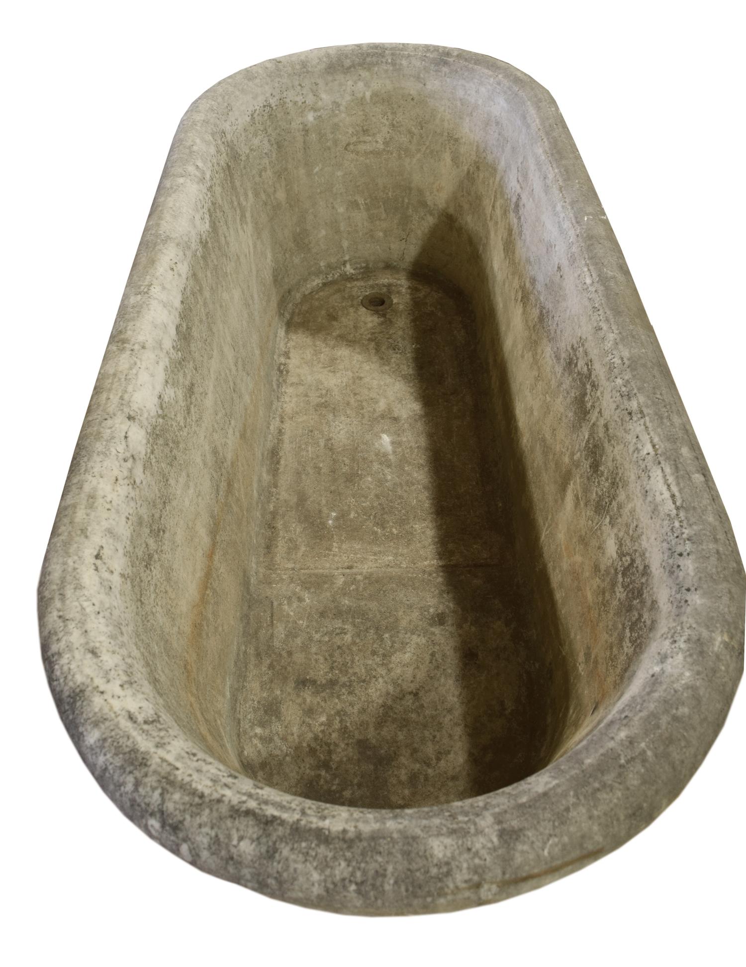 A Carved Marble Bathtub 65" W x 27" D x 23.5" H — Italy, 18th century