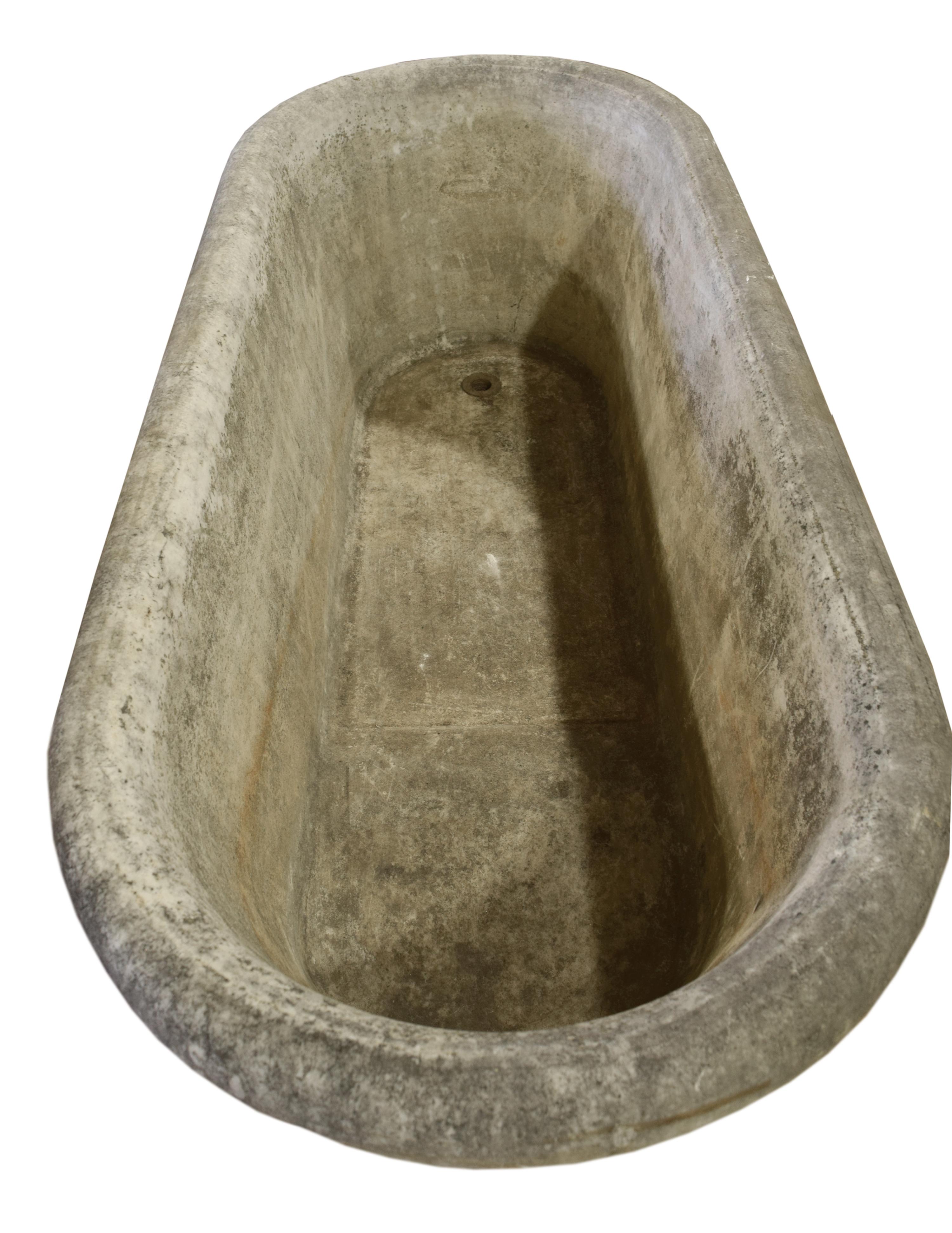 A Carved Marble Bathtub 65" W x 27" D x 23.5" H — Italy, 18th century