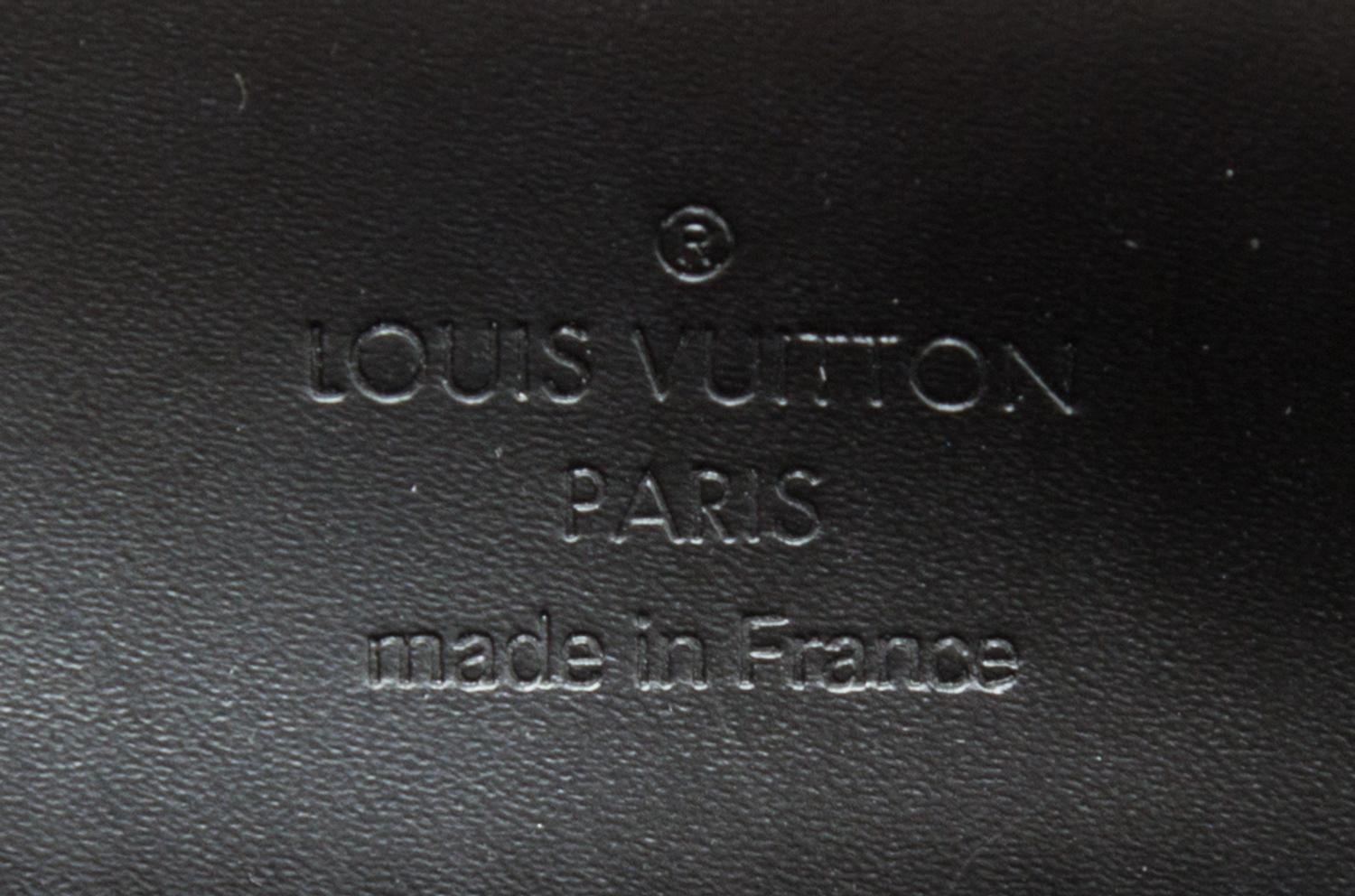 A Louis Vuitton Black Suhali Le Talentueux Handbag, 12.25" x 7" x 3.5".