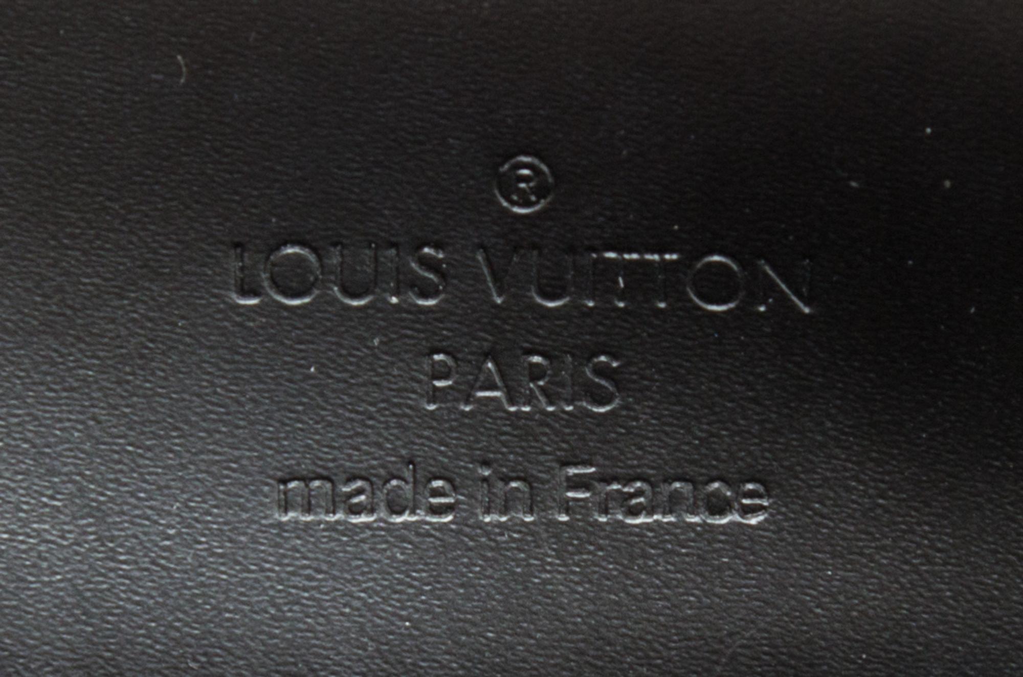 A Louis Vuitton Black Suhali Le Talentueux Handbag, 12.25" x 7" x 3.5".