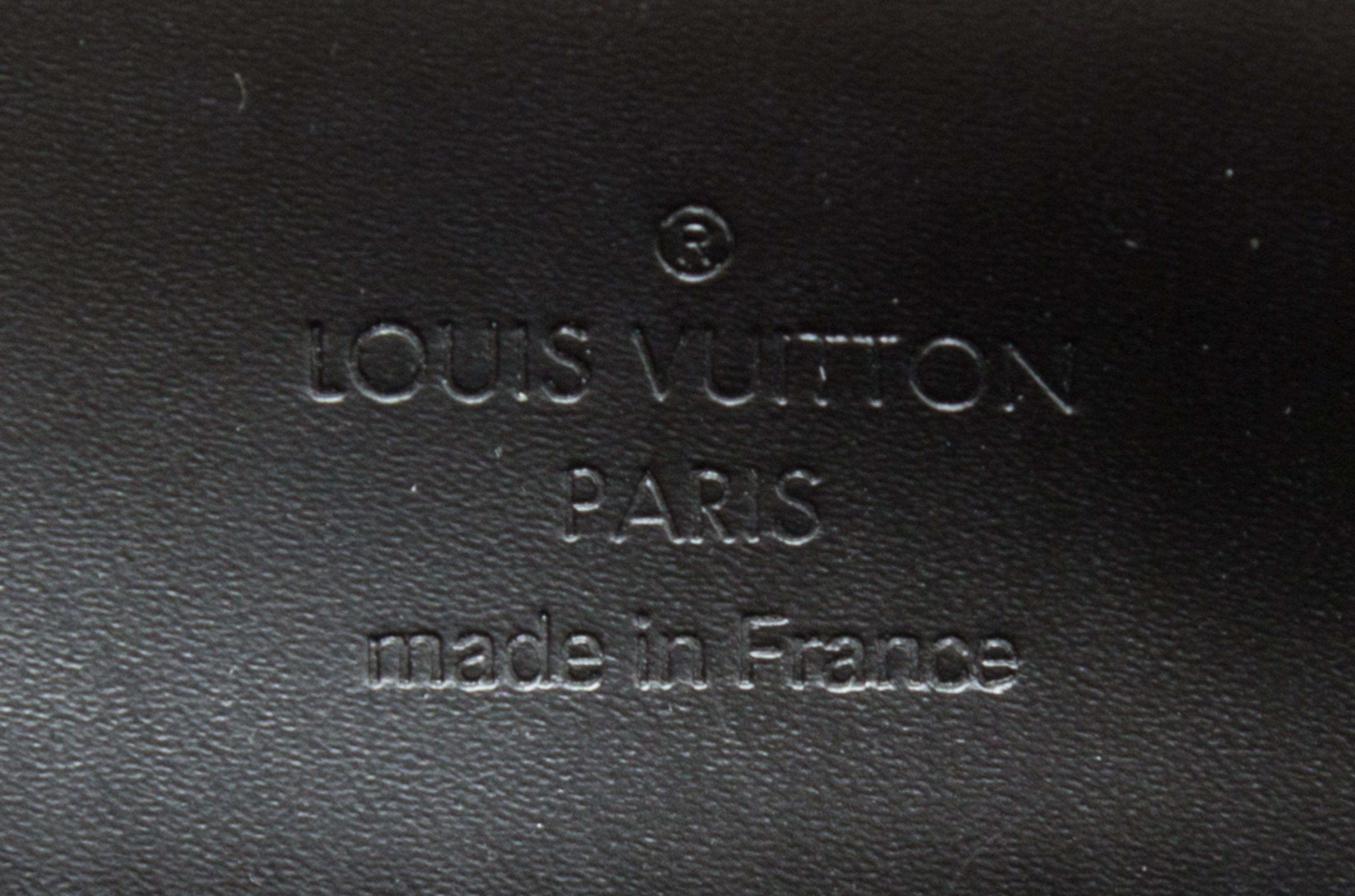A Louis Vuitton Black Suhali Le Talentueux Handbag, 12.25" x 7" x 3.5".