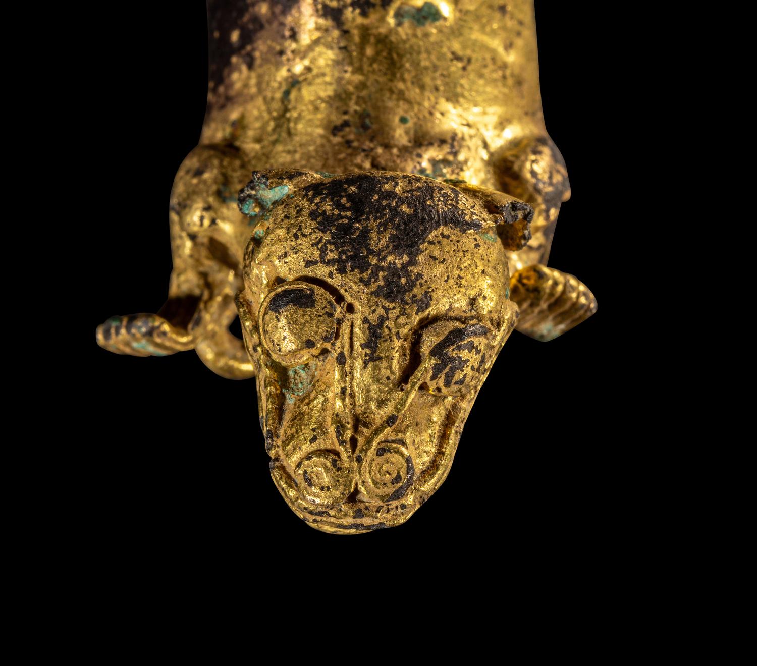 A Diquis Gold-Plated Feline Pendant
