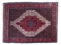 An Iranian Rug 5 feet 4 1/2 inches x 4 feet.