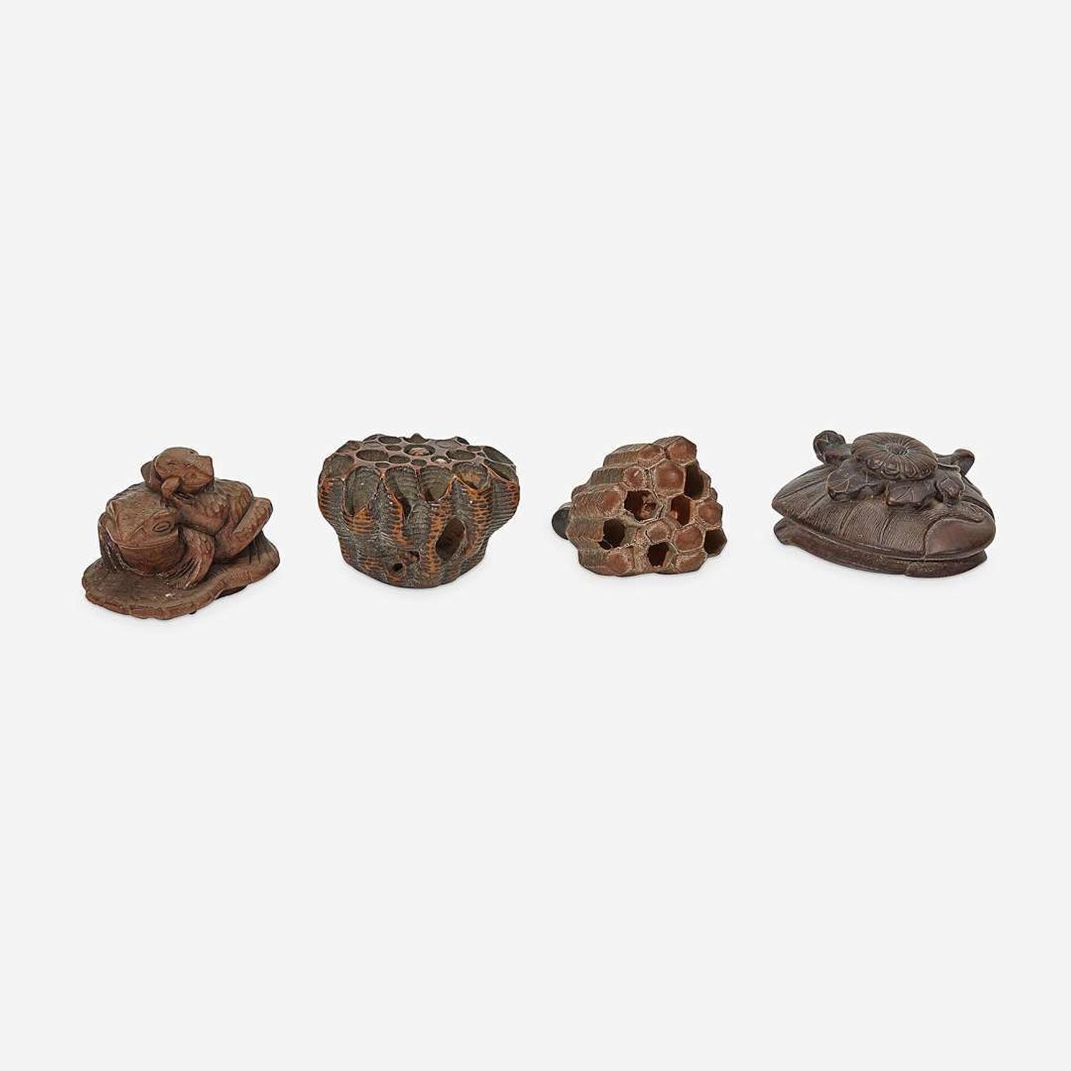 Four assorted Japanese carved wood netsuke
