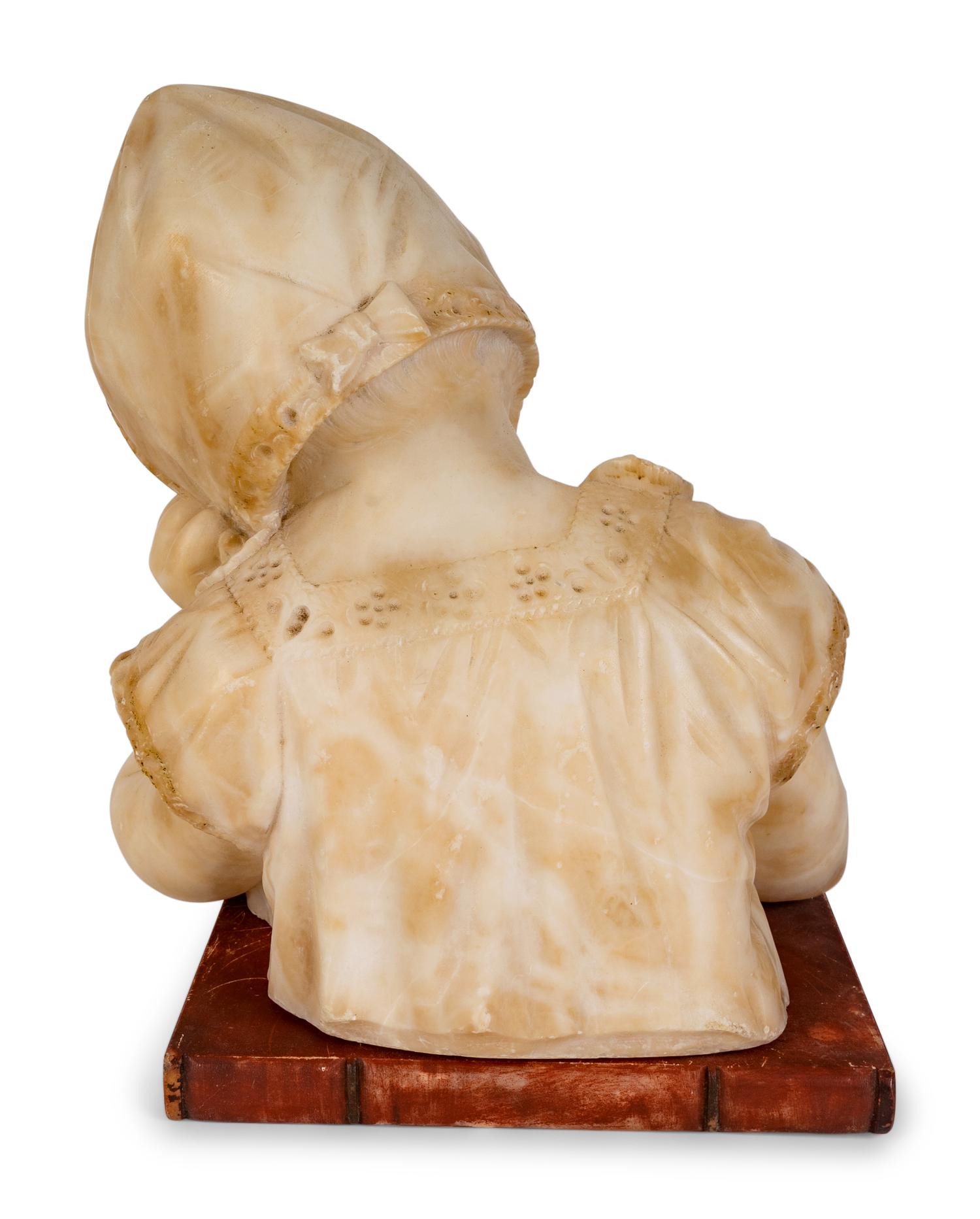 A Victorian Carved Marble Head of Young Child Reading a Primer — 19TH CENTURY