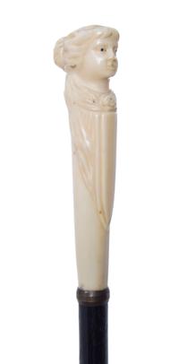 An American Walrus Ivory Handled Cane, Length of handle 5 1/2 x length overall 35 7/8 inches.