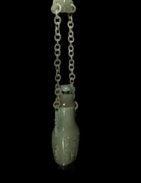 A Chinese Serpentine Baluster Vase and Cover