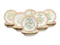 A Set of Twenty-Nine Royal Copenhagen Flora Danica Reticulated Porcelain Dinner Plates