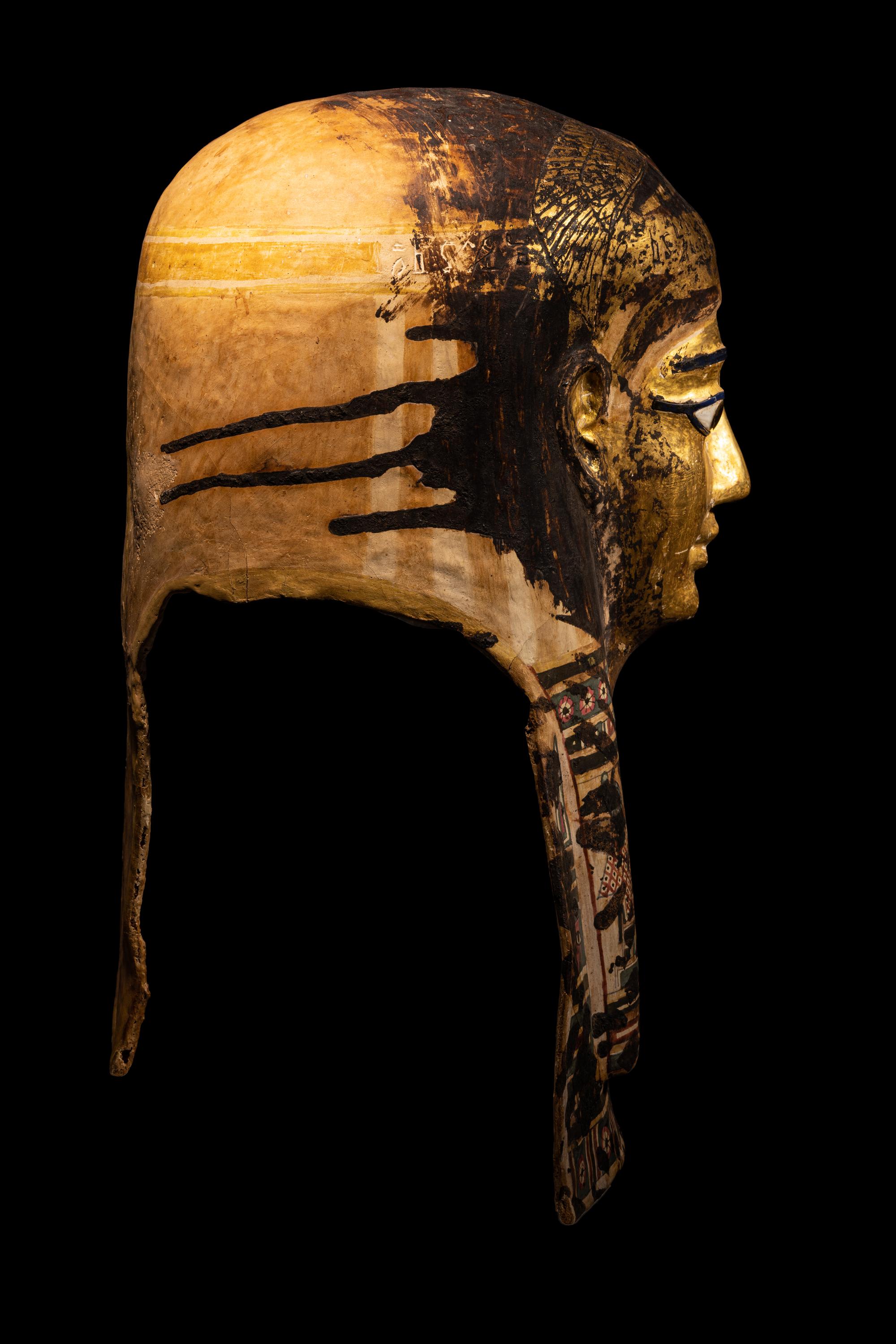 An Egyptian Gilt Cartonnage Mummy Mask