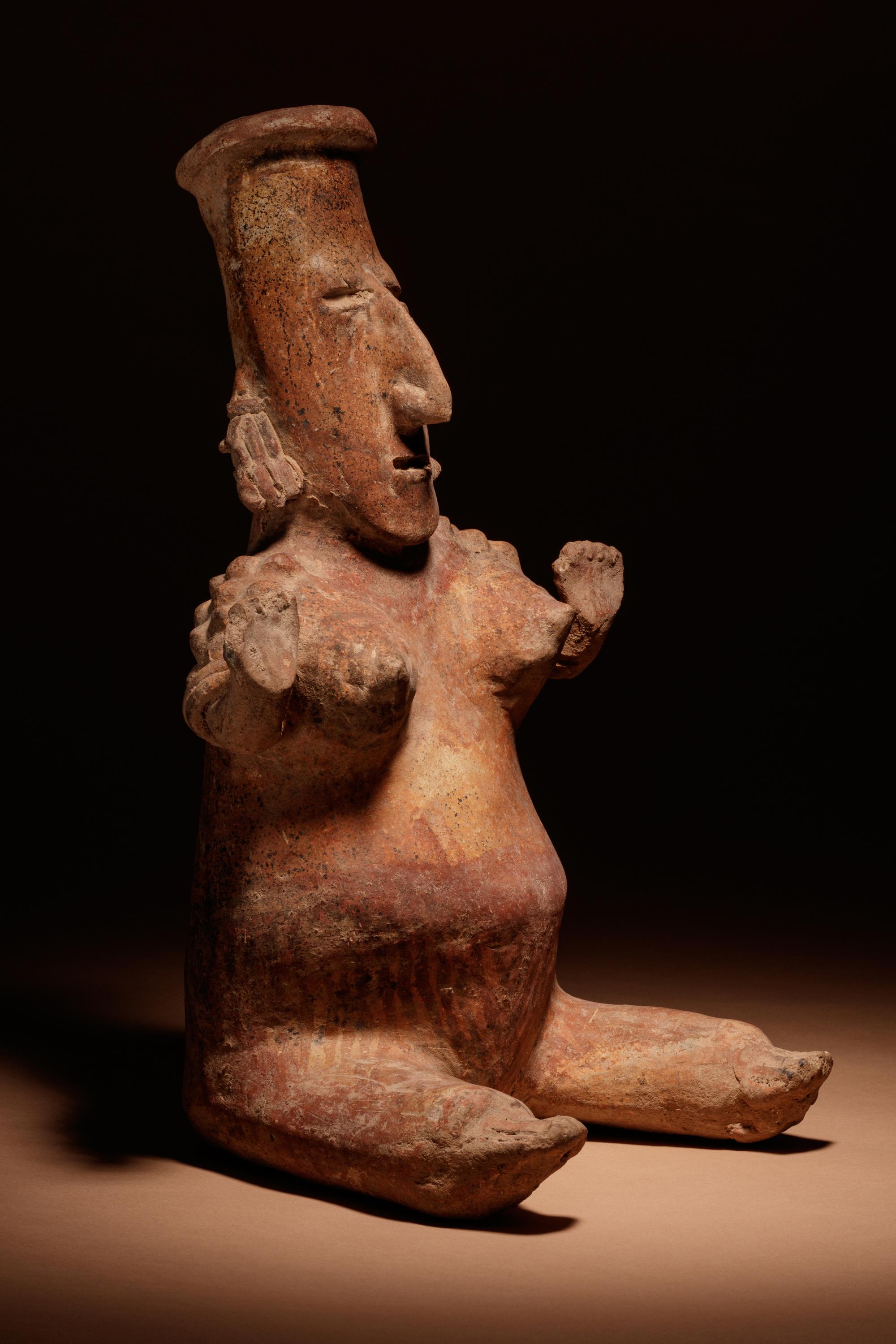 A Nayarit Terracotta Seated Female Figure