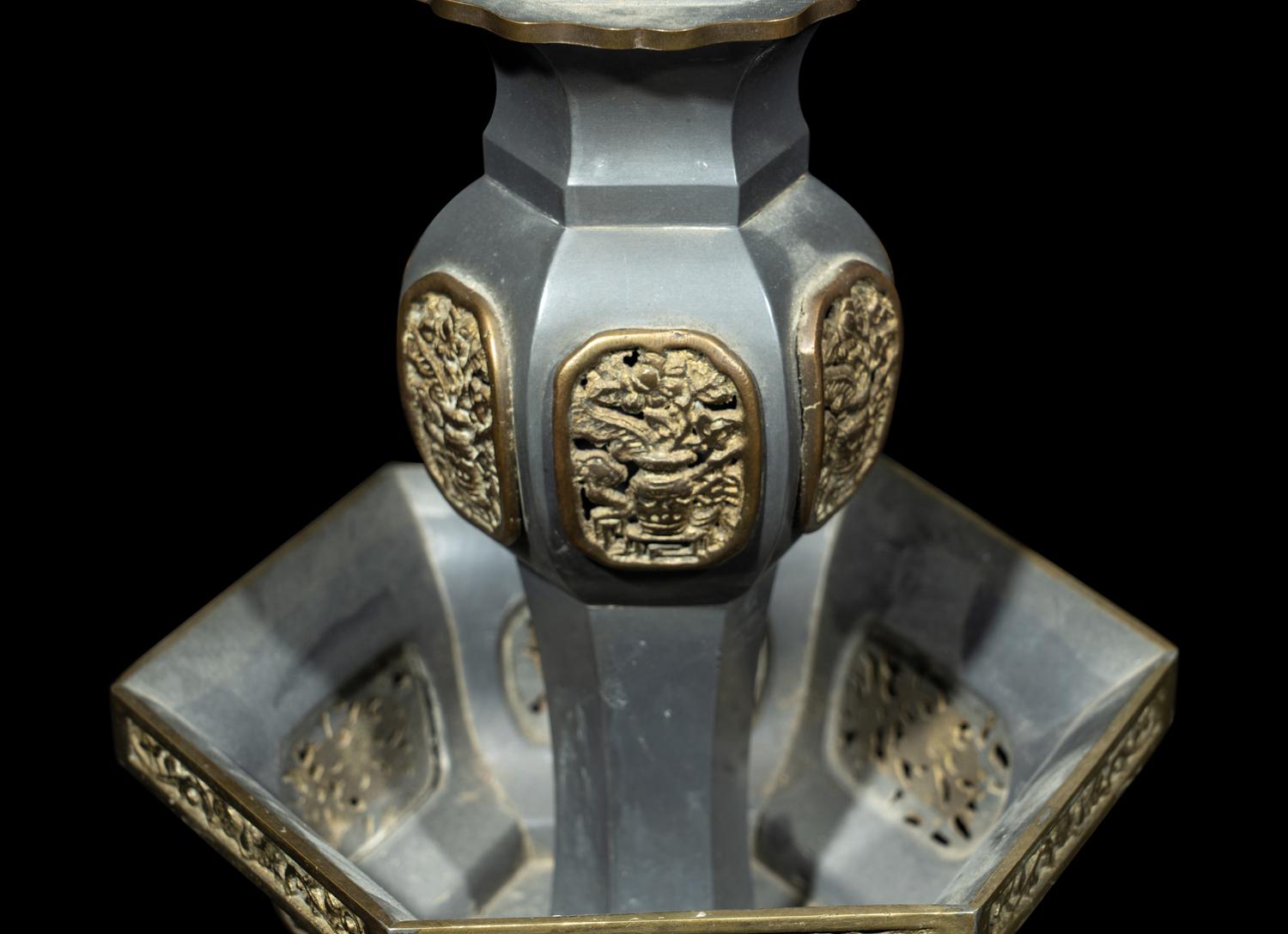 A Pair of Chinese Pewter Candle Holders