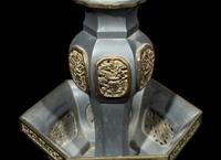 A Pair of Chinese Pewter Candle Holders