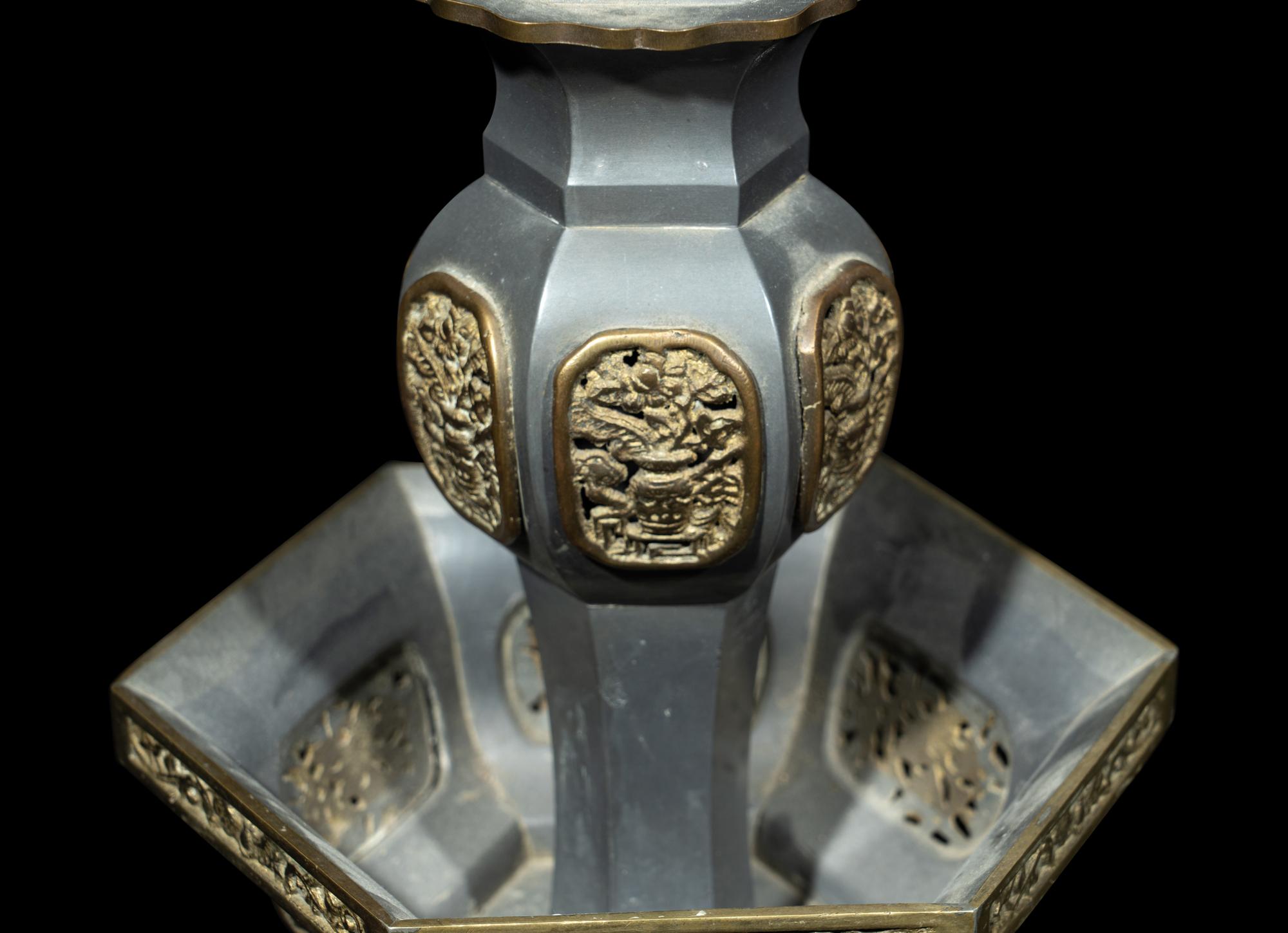 A Pair of Chinese Pewter Candle Holders