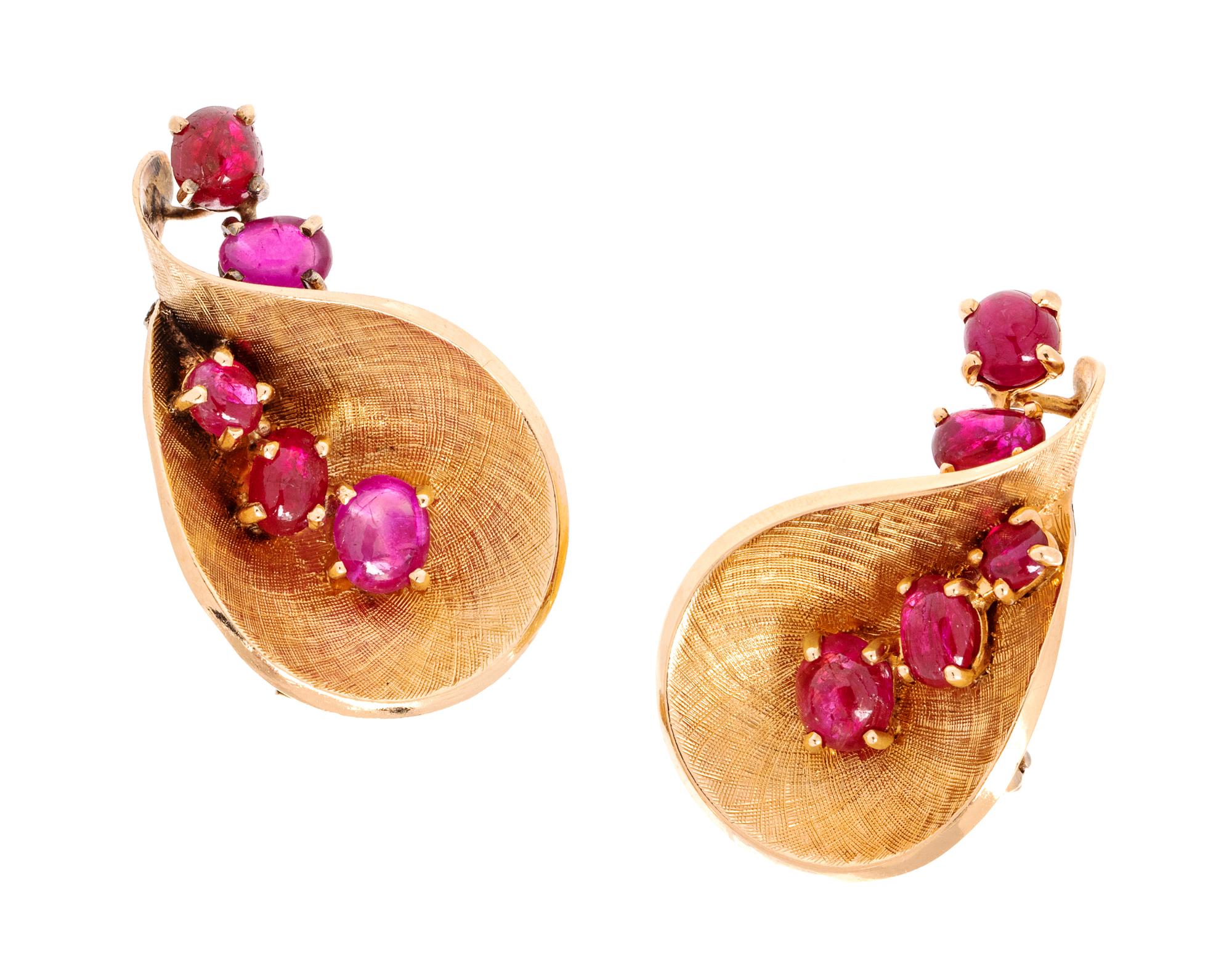A Pair of Retro Yellow Gold and Ruby Earclips, Trabert & Hoeffer-Mauboussin, 9.40 dwts.